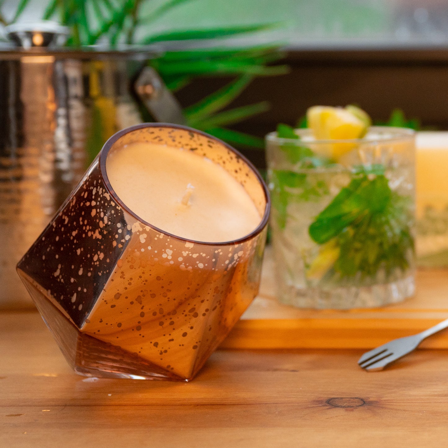 Mint Mojito with Pineapple with large soy wax scented candle and pillar scented candle with green concrete bottom on wooden table