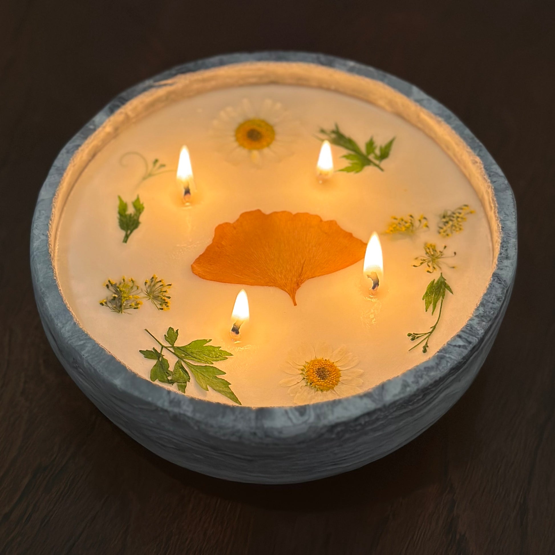 Gray Marble Concrete Container 12 Ounce Candle with Yellow and White Dried Pressed Ginkgo Leaf, Daisy Flowers, Dill Blooms and Green Leaves.